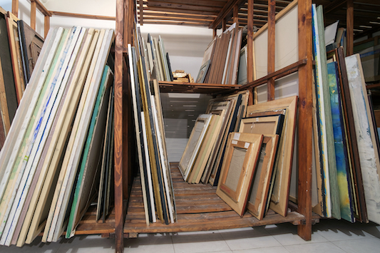 Wooden,Shelves,At,Art,Gallery,Storage,Full,Of,Pictures,And